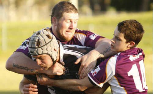 Rhinos Xavier Sullivan and Regan Burley tackle the Magpies’ Mitch McLennan. Sullivan hopes for more success in 2010. Rhinos Xavier Sullivan and Regan Burley tackle the Magpies’ Mitch McLennan. Sullivan hopes for more success in 2010.