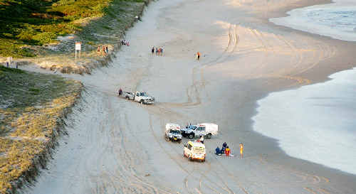 Emergency workers in action during last week’s drownings at South Ballina Beach. Emergency workers in action during last week’s drownings at South Ballina Beach.