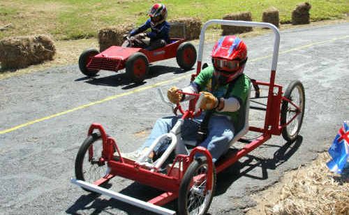Jarrod Moran, 11, and Josh Tajer, 11, concentrate on the bend at the Australia Day Billy Cart Derby. Jarrod Moran, 11, and Josh Tajer, 11, concentrate on the bend at the Australia Day Billy Cart Derby.