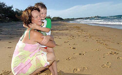 Bronwyn Zelinski ran to pull her son Myles away from the water as a shark attacked a surfer at Archie’s Beach on Wednesday. Bronwyn Zelinski ran to pull her son Myles away from the water as a shark attacked a surfer at Archie’s Beach on Wednesday.