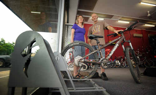 Owners of Grafton City Cycles, Sue Webber and Trevor Creighton, with the bike rack they have in the shop for cyclists to leave their bikes while shopping in the CBD. Owners of Grafton City Cycles, Sue Webber and Trevor Creighton, with the bike rack they have in the shop for cyclists to leave their bikes while shopping in the CBD.