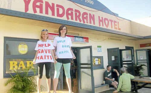 Jessy McKinnon and Mikayla Marschke raise money for Haiti victims at the Yandaran Hotel. Photo: Contributed Jessy McKinnon and Mikayla Marschke raise money for Haiti victims at the Yandaran Hotel. Photo: Contributed