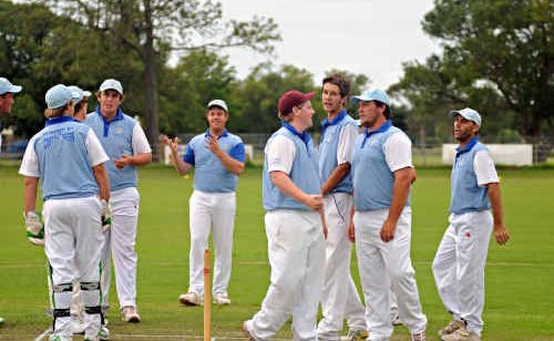 Coutts players celebrate the vital wicket of Harwood star Geoff Simmons. Coutts players celebrate the vital wicket of Harwood star Geoff Simmons.