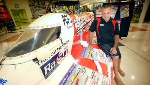 President of Australia Formula Powerboat Grand Prix Craig Truslove with a Formula 2 boat on display in Grafton Shoppingworld. President of Australia Formula Powerboat Grand Prix Craig Truslove with a Formula 2 boat on display in Grafton Shoppingworld.