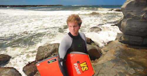 Dean Everson of Yamba prepares to head back into the surf where he was attacked by what he thinks was a white-pointer shark at Turners Beach. Dean Everson of Yamba prepares to head back into the surf where he was attacked by what he thinks was a white-pointer shark at Turners Beach.