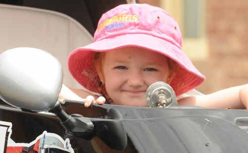 Haley Bollins, of Sydney, at the controls of her father’s powerboat at the weekend. Haley Bollins, of Sydney, at the controls of her father’s powerboat at the weekend.