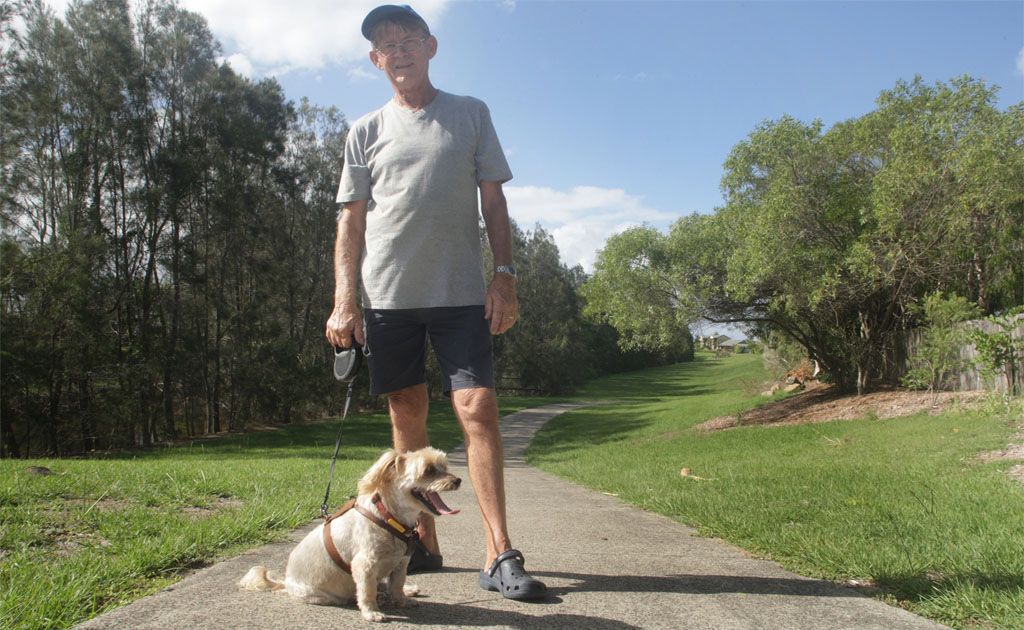 Kingscliff resident Craig Moore and dog Sophie take ing one of their last strolls on the path about to be ripped up. Kingscliff resident Craig Moore and dog Sophie take ing one of their last strolls on the path about to be ripped up.