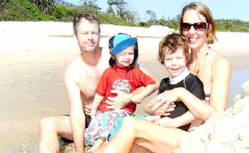 Soaking up the sun at Byron Bay yesterday were Sarah Butcher and John Edgcombe, and their children George, 4, and Luke, 2, who are on a week’s holiday from Sydney. Soaking up the sun at Byron Bay yesterday were Sarah Butcher and John Edgcombe, and their children George, 4, and Luke, 2, who are on a week’s holiday from Sydney.