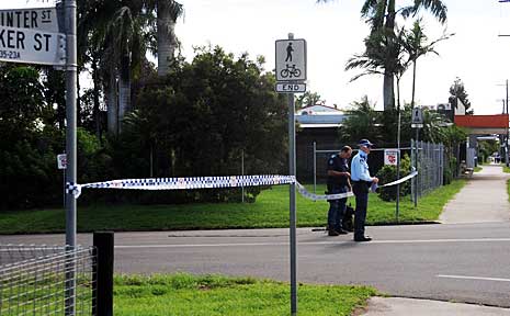 Police guard the taped-off area near the family home in Walker Street. Police guard the taped-off area near the family home in Walker Street.