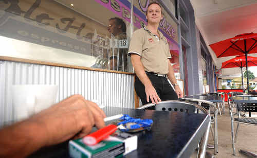 Purple Haze owner Mark Paterson is considering implementing and policing his own designated smoking area to cater for both smokers and non-smokers in his outside dining area. Purple Haze owner Mark Paterson is considering implementing and policing his own designated smoking area to cater for both smokers and non-smokers in his outside dining area.