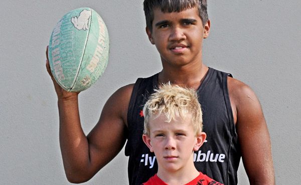 Ethan Roberts, 13 stands over the top of Tristan Ellison, 13 - who is 25 days older than him - they both play in the same rugby league team. Ethan Roberts, 13 stands over the top of Tristan Ellison, 13 - who is 25 days older than him - they both play in the same rugby league team.