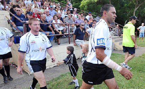 David Peachey led the Magpies on to the paddock for their clash with Army. David Peachey led the Magpies on to the paddock for their clash with Army.