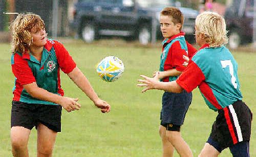 Maryborough under-12 boys Jesse Robertson and Ben Waters show their teamwork. Maryborough under-12 boys Jesse Robertson and Ben Waters show their teamwork.
