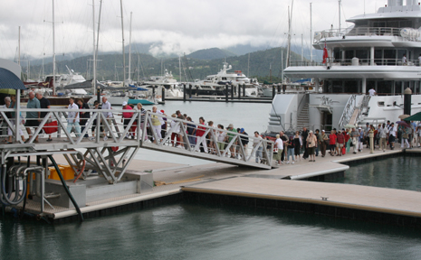 Passengers from the Queen Mary 2 cruise ship disembark from transfer vessels at Abel Point Marina to enjoy a day long visit to the Whitsundays. Passengers from the Queen Mary 2 cruise ship disembark from transfer vessels at Abel Point Marina to enjoy a day long visit to the Whitsundays.