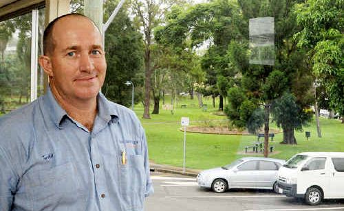 Todd White was keeping an eye out for rising flood waters from the rear of his Mary Street business, Big Bargain Furniture. Todd White was keeping an eye out for rising flood waters from the rear of his Mary Street business, Big Bargain Furniture.