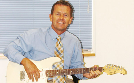 New principal of St John’s Catholic School in Mullumbimby Tim Bleakley is a keen guitarist. New principal of St John’s Catholic School in Mullumbimby Tim Bleakley is a keen guitarist.