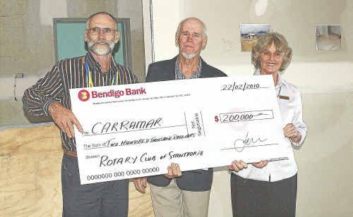 Rotary Club of Stanthorpe president Alec Harslett presents a cheque for $200,000 to Carramar board chairman Brough Warren and Val Taylor. Rotary Club of Stanthorpe president Alec Harslett presents a cheque for $200,000 to Carramar board chairman Brough Warren and Val Taylor.