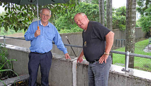 Richmond River Country Council engineer Bill Moorhouse and president John Chant with the crack in the levee wall. Richmond River Country Council engineer Bill Moorhouse and president John Chant with the crack in the levee wall.