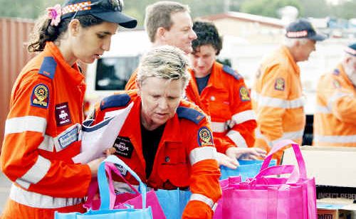 SES crews from South East Queensland prepare shopping bags of supplies to take to the flood-devastated community of Charleville. SES crews from South East Queensland prepare shopping bags of supplies to take to the flood-devastated community of Charleville.