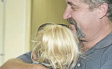 Jessica's dad, Shayne Parfrey, consoles his daughter in Gladstone. Jessica's dad, Shayne Parfrey, consoles his daughter in Gladstone.