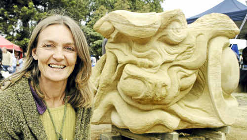 Lana Tyacke with her piece from the 2008 Sculpture Symposium. Lana Tyacke with her piece from the 2008 Sculpture Symposium.