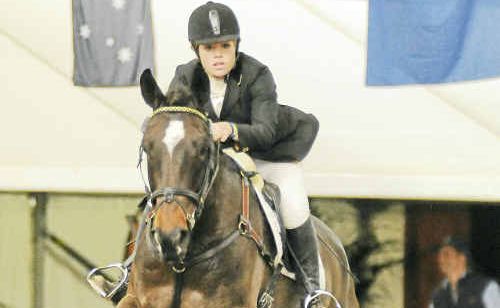 Helen Goddard rides Kilburi Mambo over a showjump in a clear two-star round in Melbourne in an overall 10th place. Helen Goddard rides Kilburi Mambo over a showjump in a clear two-star round in Melbourne in an overall 10th place.