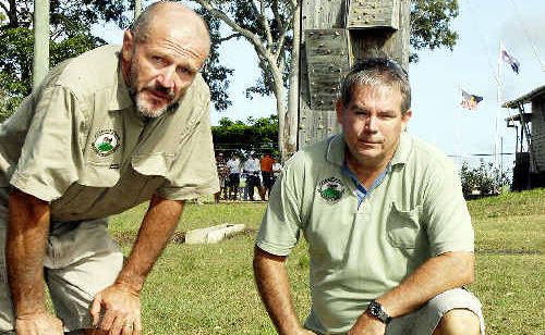 Glendyne teacher Mark Macrae (left) and principal Dale Hansen inspect one of the mauled sheep at the school. Glendyne teacher Mark Macrae (left) and principal Dale Hansen inspect one of the mauled sheep at the school.