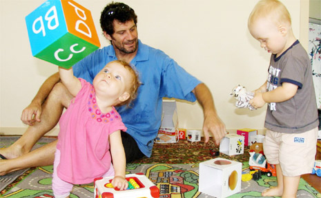 Ten-month-old Mylee Farrell (pictured, front) shows that walking and weight lifting can be achieved at the same time, while Steve Cooper and son Bailey have a chat about tigers and all the other toys at Dads’ Playgroup at Ocean Shores. Ten-month-old Mylee Farrell (pictured, front) shows that walking and weight lifting can be achieved at the same time, while Steve Cooper and son Bailey have a chat about tigers and all the other toys at Dads’ Playgroup at Ocean Shores.