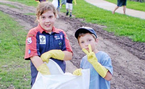 Caitlyn Meiklejohn and Alex Kirk help to pick up the rubbish for Clean Up Australia Day. Photo SUPPLIED Caitlyn Meiklejohn and Alex Kirk help to pick up the rubbish for Clean Up Australia Day. Photo SUPPLIED