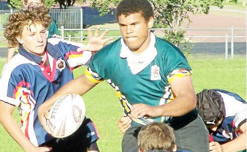 Warwick High trio Mitchell Forrest (facing camera), Shaun Treasure (No. 5) and Callum Miller (head gear) in action against Assumption College in Broncos Cup rugby league. Warwick High trio Mitchell Forrest (facing camera), Shaun Treasure (No. 5) and Callum Miller (head gear) in action against Assumption College in Broncos Cup rugby league.