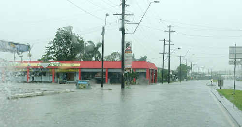 HEAVY rain pummels the Big Bear shopping centre on Harbour Road at daybreak yesterday with drains struggling to cope. HEAVY rain pummels the Big Bear shopping centre on Harbour Road at daybreak yesterday with drains struggling to cope.