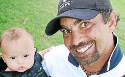 Sovereign Animals century maker Greg Louis and son Bilyan at the reserve-grade grand final. Sovereign Animals century maker Greg Louis and son Bilyan at the reserve-grade grand final.