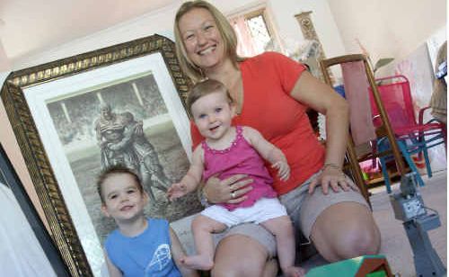Jag and Kinlee Gelkov with Lahnie Ward, below, and memorabilia donated for the benefit. Jag and Kinlee Gelkov with Lahnie Ward, below, and memorabilia donated for the benefit.