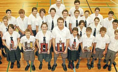 PE teacher Brooke Stockham with The Scots PGC College swimmers who competed at the TAS swimming carnival. PE teacher Brooke Stockham with The Scots PGC College swimmers who competed at the TAS swimming carnival.