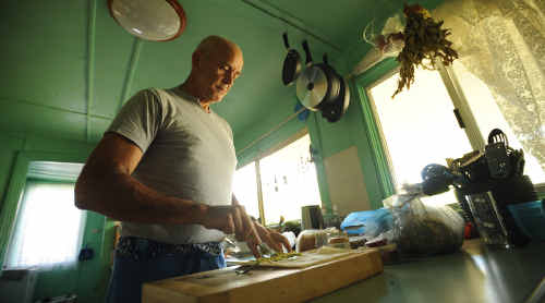 NOW: Peter Casson prepares a healthy lunch for himself. NOW: Peter Casson prepares a healthy lunch for himself.