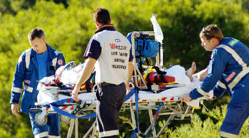 The Westpac Life Saver Rescue Helicopter crew and ambulance paramedics help a man injured in a gyrocopter crash at Evans Head on Saturday. He was taken to Lismore Base Hospital in a serious condition. The Westpac Life Saver Rescue Helicopter crew and ambulance paramedics help a man injured in a gyrocopter crash at Evans Head on Saturday. He was taken to Lismore Base Hospital in a serious condition.