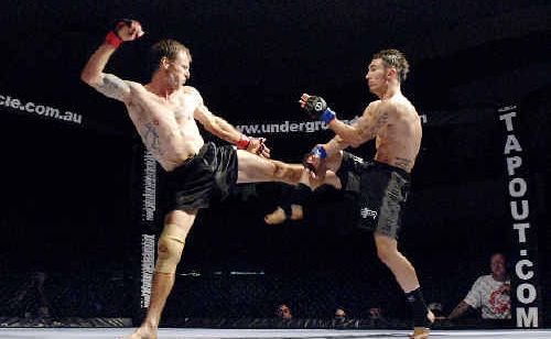 Andrew Beverage (left) and Luke Morris battle it out during the Underground MMA Cage Fighting tournament at the Lismore Workers Club on Saturday night. Andrew Beverage (left) and Luke Morris battle it out during the Underground MMA Cage Fighting tournament at the Lismore Workers Club on Saturday night.