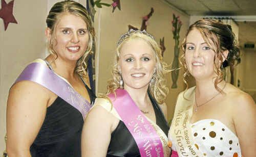 Miss Showgirl runner-up Jessica O’Brien and Miss Showgirl Kelsey Burt and Miss Showgirl entrant Janita Volker at the Warwick Show Ball Saturday night. Miss Showgirl runner-up Jessica O’Brien and Miss Showgirl Kelsey Burt and Miss Showgirl entrant Janita Volker at the Warwick Show Ball Saturday night.