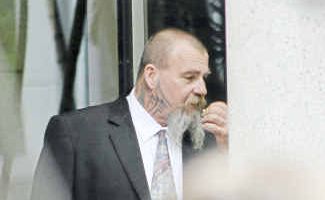 Taking a breather: Darrell Vincent Cross outside the District Court in Brisbane. Taking a breather: Darrell Vincent Cross outside the District Court in Brisbane.