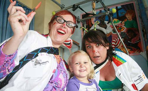Dr Sniggles and Dr Dandy Frock entertain Madison in the children’s ward. Dr Sniggles and Dr Dandy Frock entertain Madison in the children’s ward.