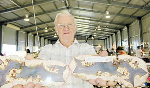 Peek inside: Warwick and District Lapidary Club president and Warwick Easter Rock Swap organiser Syd Woodrow with a prized thunder egg rock he found. Peek inside: Warwick and District Lapidary Club president and Warwick Easter Rock Swap organiser Syd Woodrow with a prized thunder egg rock he found.