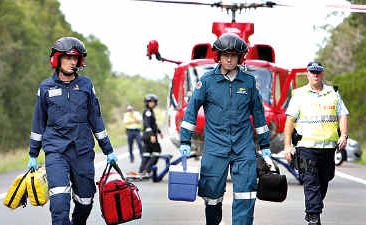 Paramedics attend the accident. Paramedics attend the accident.