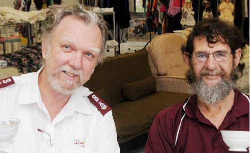 Major Peter Maynard and Gordon Adams show off a tea set on sale when the new Salvo’s shop opens Tuesday. Major Peter Maynard and Gordon Adams show off a tea set on sale when the new Salvo’s shop opens Tuesday.