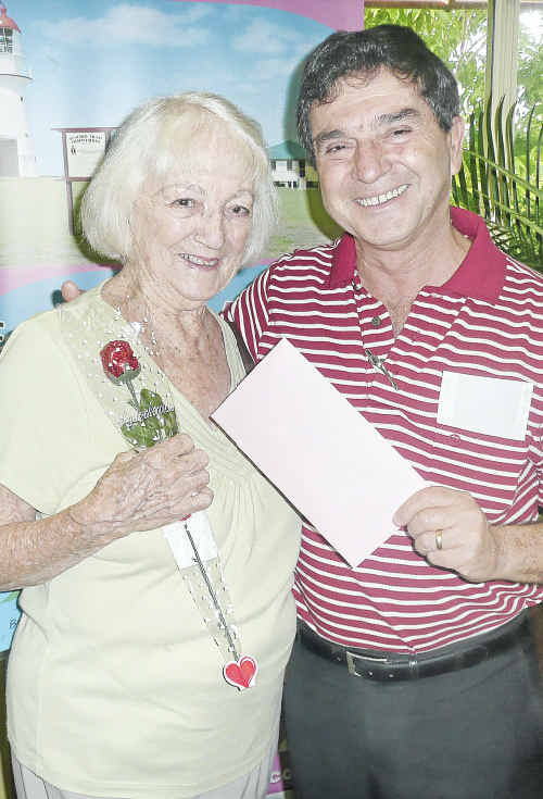 Agnes Water Visitor Centre volunteer Liz Aitken, who has just turned 90, with GAPDL Chairman Peter Corones. Agnes Water Visitor Centre volunteer Liz Aitken, who has just turned 90, with GAPDL Chairman Peter Corones.