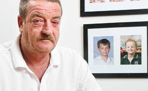 Lindsay Halliwell looks through some photos of his two sons, Timothy and Steven. Lindsay Halliwell looks through some photos of his two sons, Timothy and Steven.