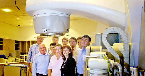 Excited over the promised new PET scanner for the Lismore Base Hospital are (front, from left) Kel Lavis and Gae Ferris, of Summerland Sunrise, NSW Cancer Council representative Kerrie Gray, Federal Page MP Janelle Saffin and Marshall Fittler, of Our Health; (rear) Dr Austin Curtin, medical oncologist Dr Adam Boyce, Lismore mayor Jenny Dell, State Ballina MP Don Page and Dr Chris Ingall. They are in the new cancer care unit, with the hospital’s old linear accelerator. Excited over the promised new PET scanner for the Lismore Base Hospital are (front, from left) Kel Lavis and Gae Ferris, of Summerland Sunrise, NSW Cancer Council representative Kerrie Gray, Federal Page MP Janelle Saffin and Marshall Fittler, of Our Health; (rear) Dr Austin Curtin, medical oncologist Dr Adam Boyce, Lismore mayor Jenny Dell, State Ballina MP Don Page and Dr Chris Ingall. They are in the new cancer care unit, with the hospital’s old linear accelerator.