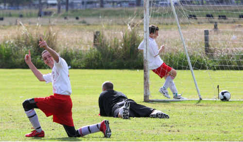 Majos Mad Dogs’ Luke Cox is pumped after scoring against South Services at Rushforth Park. Majos Mad Dogs’ Luke Cox is pumped after scoring against South Services at Rushforth Park.