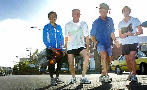 Fun run: Dr Charlie Hew, Father Paul McDonald, Professor Zbys Klichand librarian Denise O’Brien train in the early hours of the morning in the hope of competing in the Gold Coast Marathon later this year. Fun run: Dr Charlie Hew, Father Paul McDonald, Professor Zbys Klichand librarian Denise O’Brien train in the early hours of the morning in the hope of competing in the Gold Coast Marathon later this year.