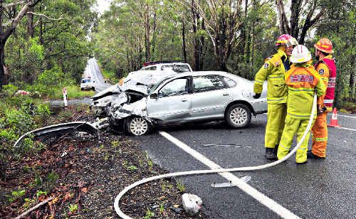 Fire crews at the crash scene yesterday. Fire crews at the crash scene yesterday.