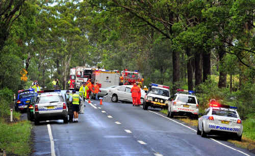 Enough is enough: The scene of yet another tragedy on the Pacific Highway, this time at Urunga, south of Coffs Harbour. Two men, aged 20 and 64, lost their lives. Enough is enough: The scene of yet another tragedy on the Pacific Highway, this time at Urunga, south of Coffs Harbour. Two men, aged 20 and 64, lost their lives.